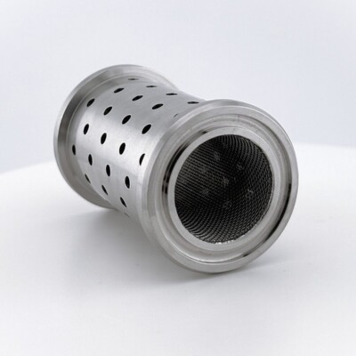 A cylindrical metal filter with perforated holes and a fine mesh screen on one end, placed on a white surface.