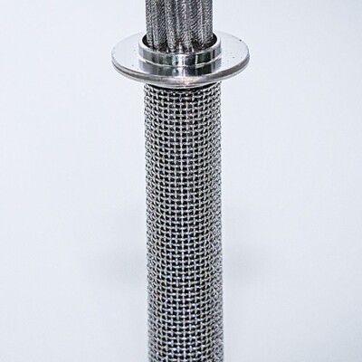 Cylindrical metal mesh filter with a flange, standing upright on a white background.