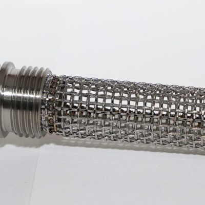 A close-up of a metal mesh hydraulic filter element with threaded fitting, placed on a white background.